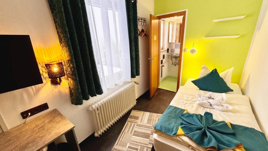 Gemütliches Einzelzimmer im Hotel Paidion – ideal für Biker und Wanderer